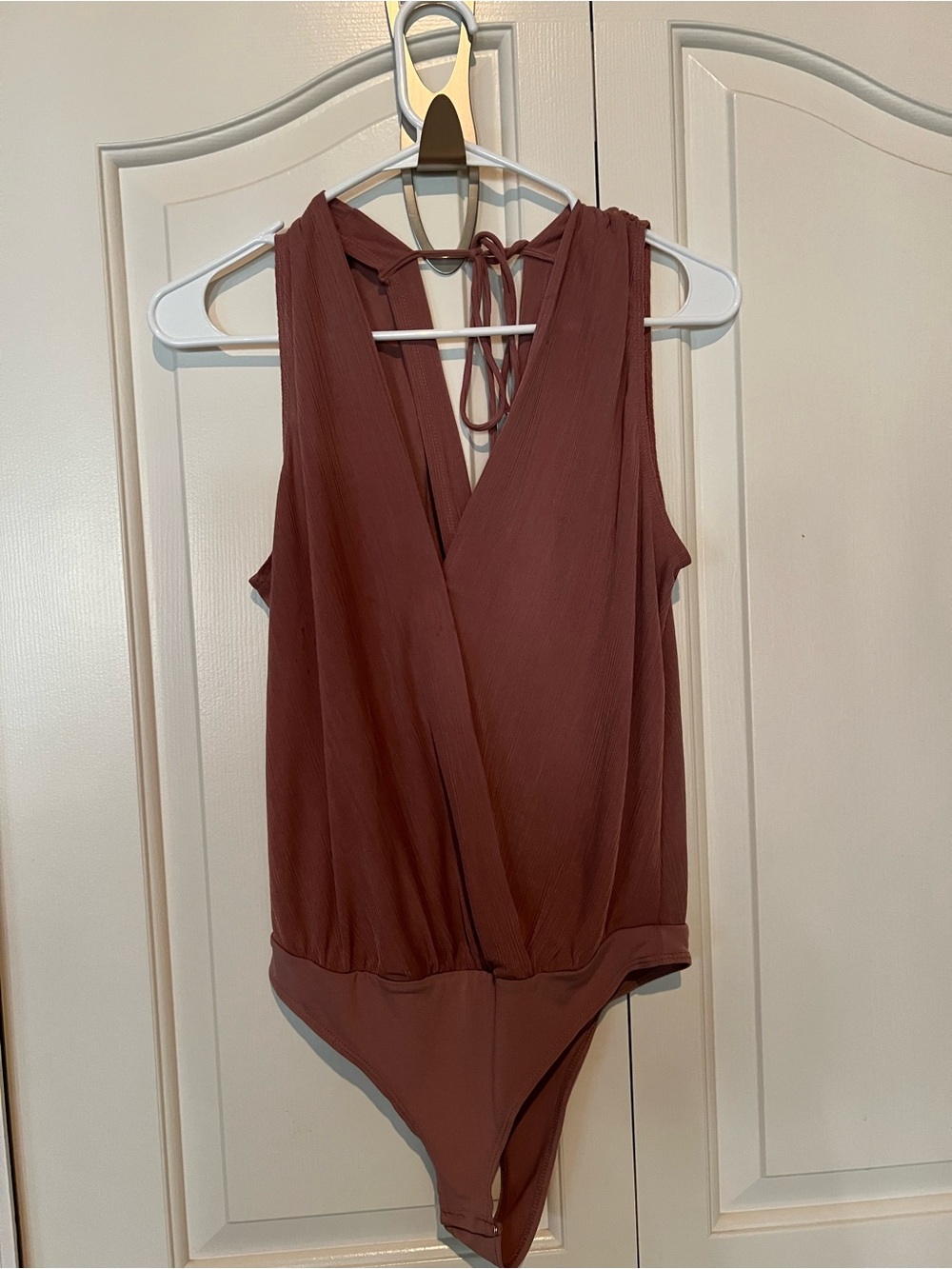 BCBGeneration Sleeveless Wrap V-Neck Bodysuit in Mauve